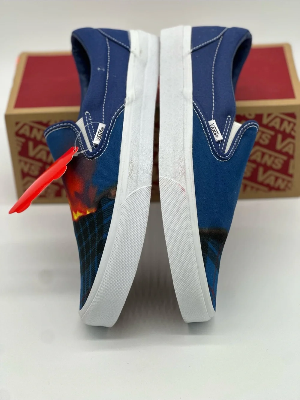 Vans Blue Plaid Slip-On Sneakers with Orange Accent